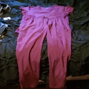Chic Pink Jumpsuit with Relaxed Fit and Tapered Legs